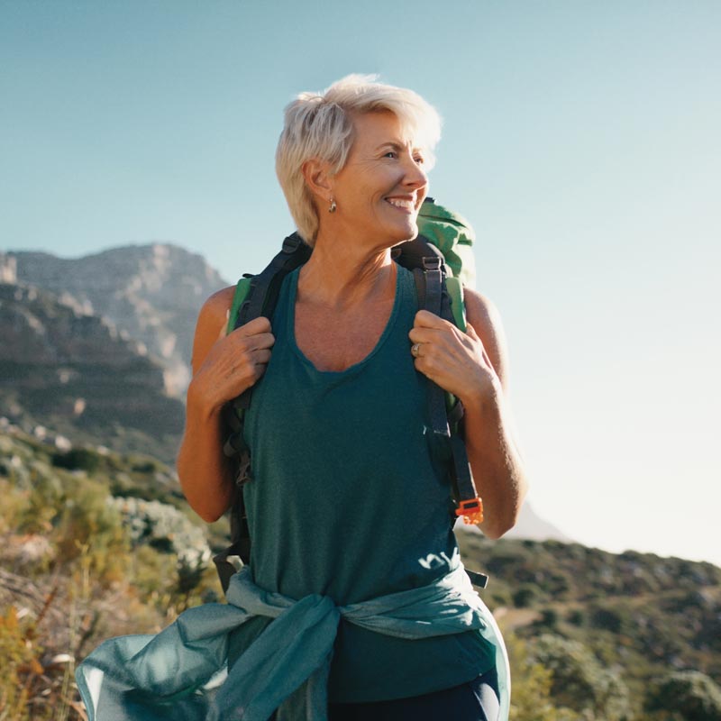 senior woman on hike in mountains