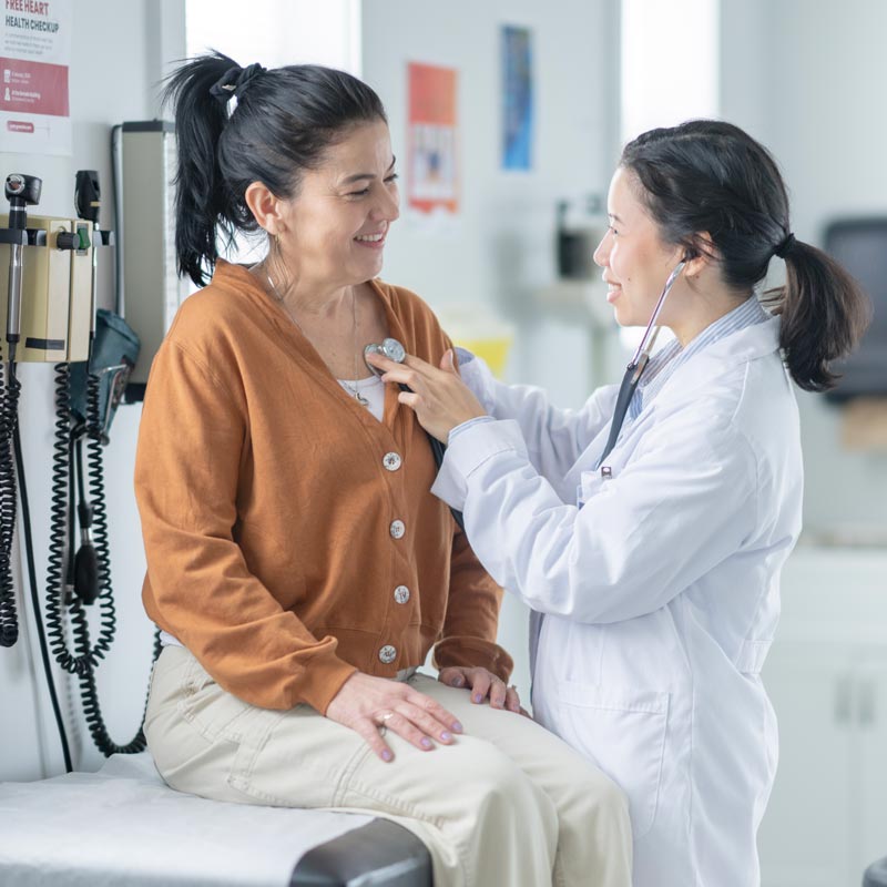 doctor examining patient